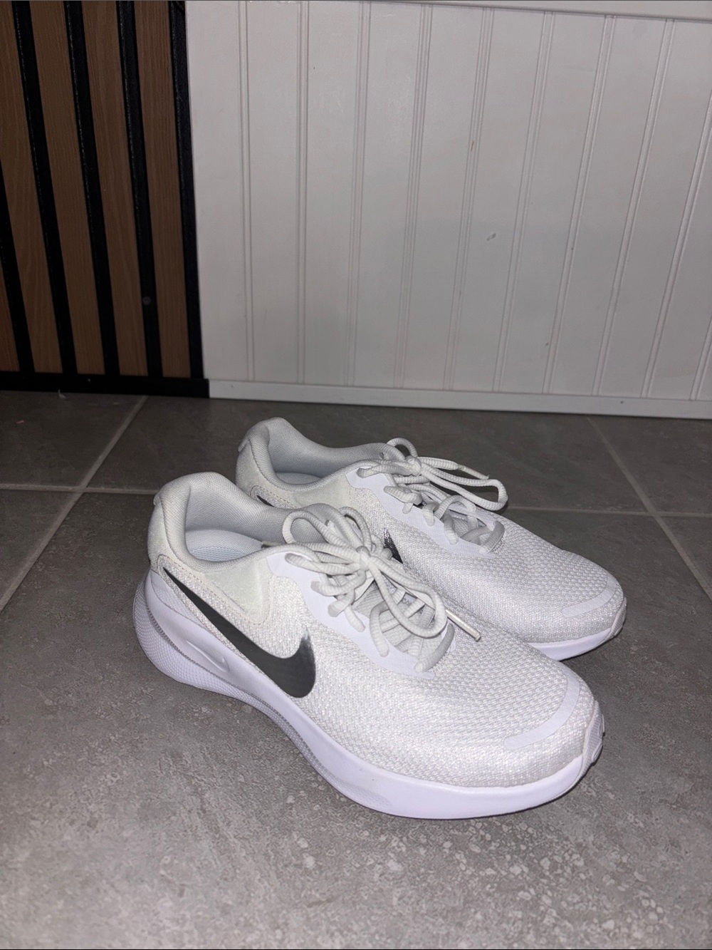 Nike White Sneakers with Black Swoosh